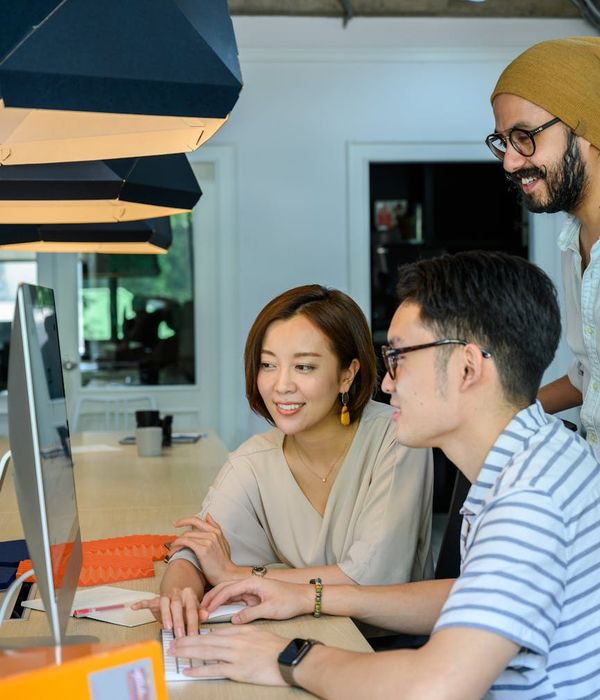 Modern mobile development team collaborating on application design